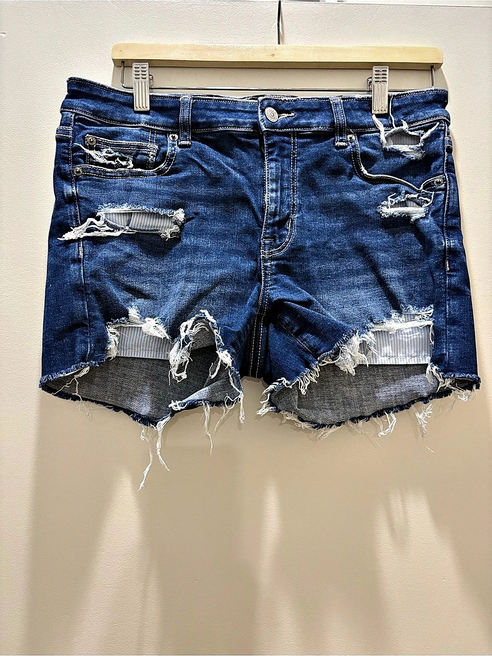 American Eagle Women's Distressed Jean Shorts with Stripped Pattern Pocket Inser